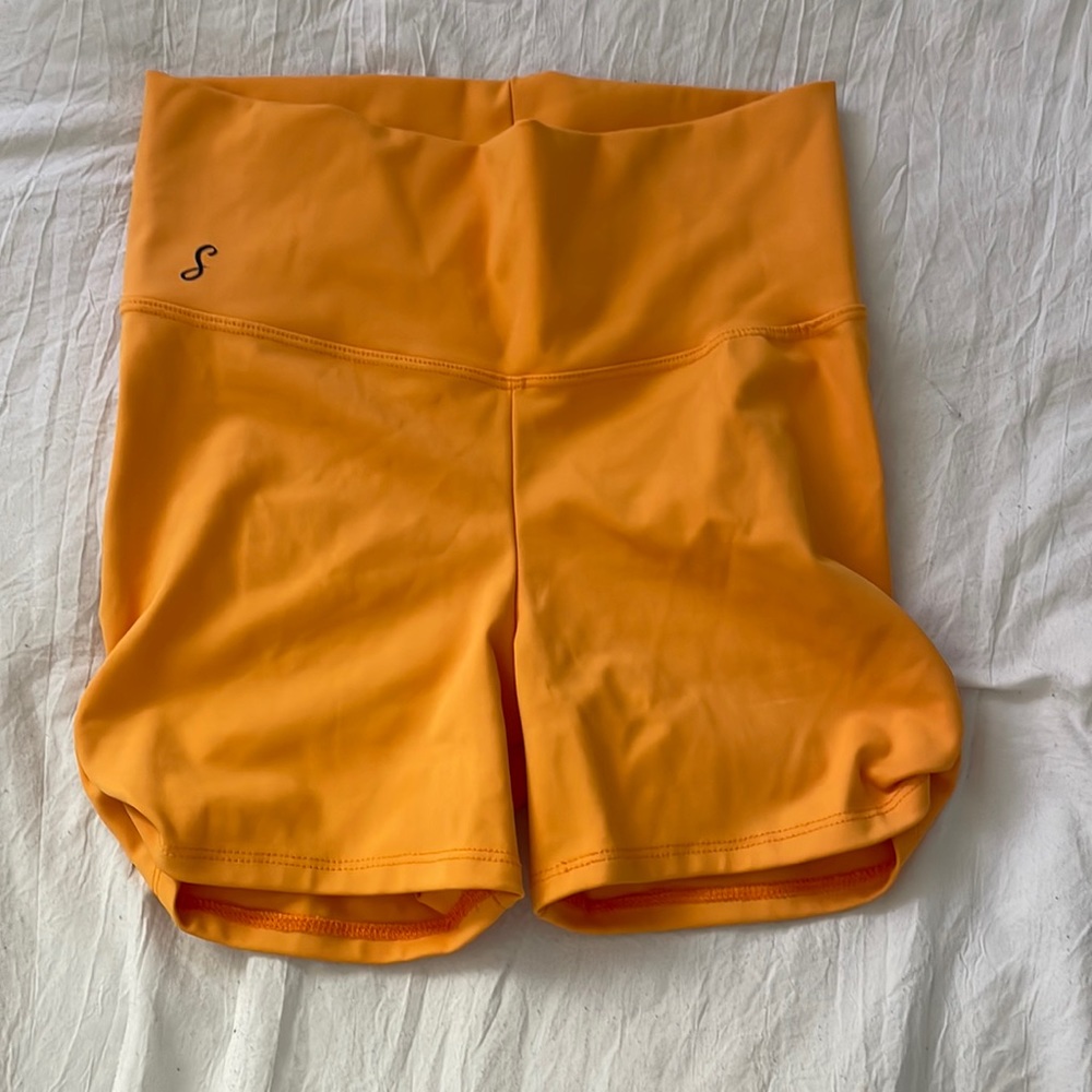 Soel dancewear mango orange biker shorts in size teen medium